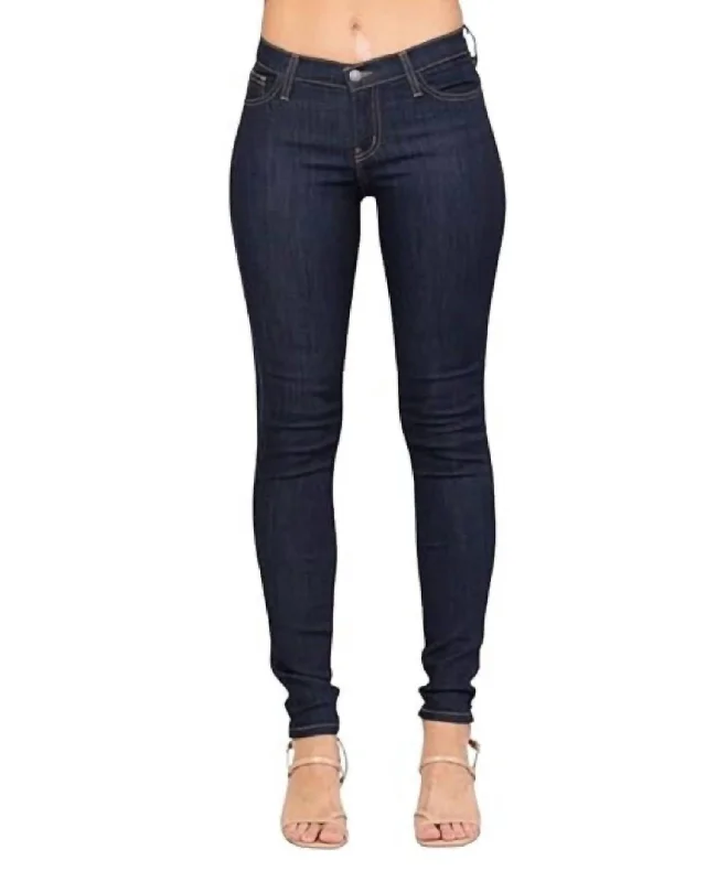 Dark Wash Mid Rise Skinny Jeans In Dark Denim